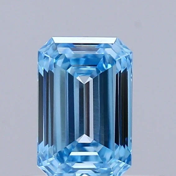0.56 Carat Emerald Shaped, Ideal Cut, FANCY VIVID BLUE Color, VVS1 Clarity, IGI Certified Lab Grown Diamond