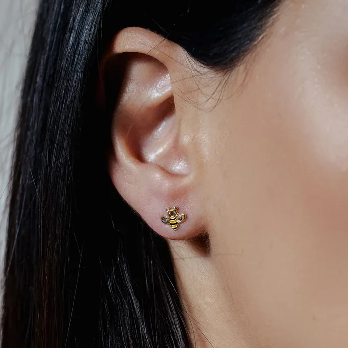 14E00432. – 14 Karat Yellow Bee Black and Yellow Enamel Clear CZ Screw Back Earrings