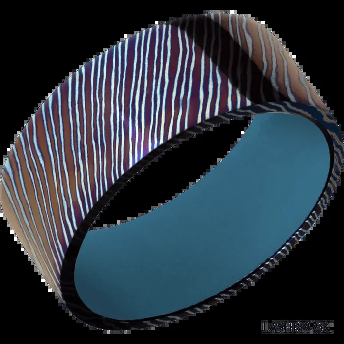9 mm wide Flat Titanium Damascus band featuring a Royal Blue sleeve.
