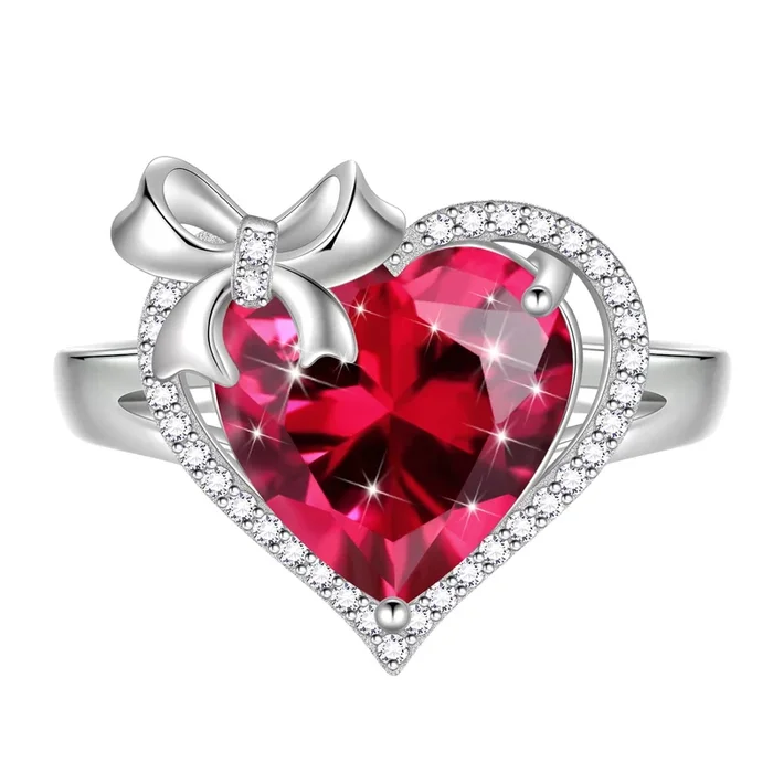 Anillo de plata de ley 925 con corazón de 6 quilates, lazo y cinta, rubí (piedra natal de julio). Anillo abierto. Joyería ideal como regalo de San Valentín para esposa, novia, pareja o madre.
