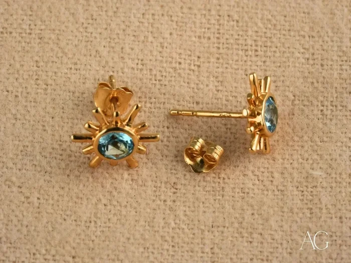 Celestial Glow: 18k Gold Blue Topaz Stud Earrings