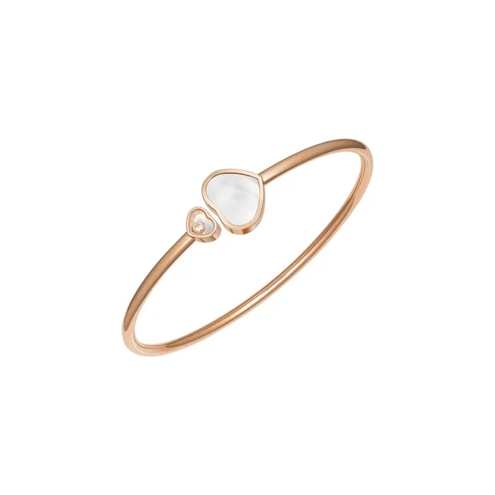 Chopard Happy Hearts bangle bracelet in rose gold, diamonds, and mother-of-pearl