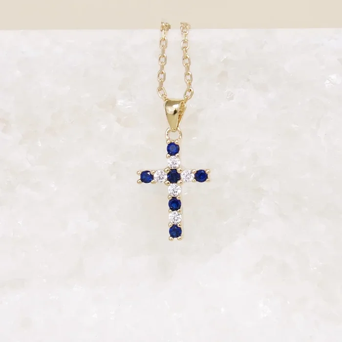 Gold-plated blue and white oxide cross pendant