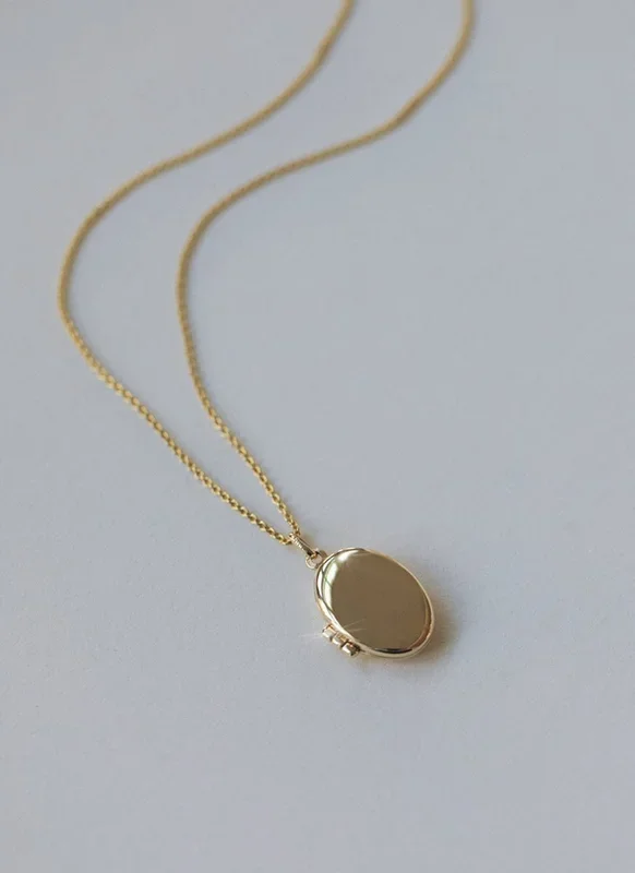 Ollie signet medallion 14k goud